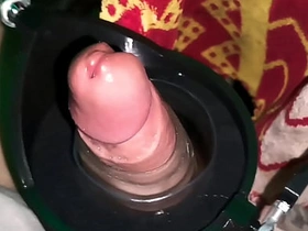 A jerk-off robot tests the stamina of a large penis. chinese merry porn clips